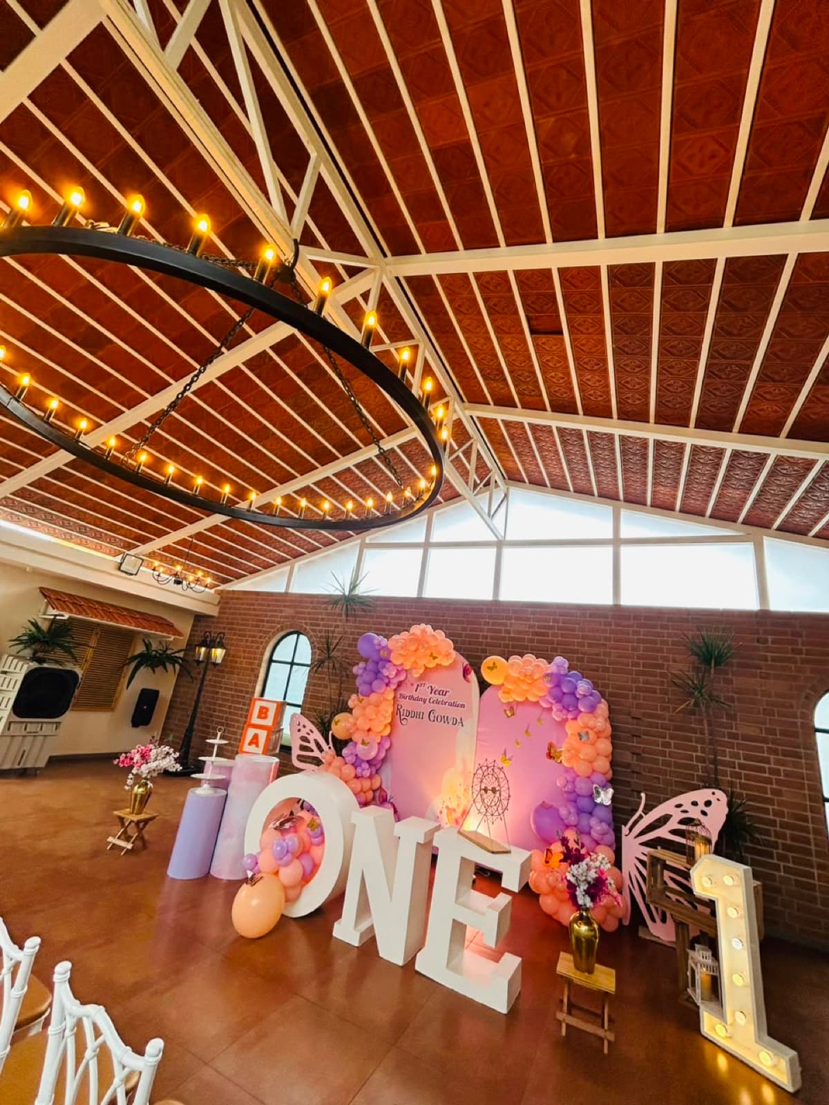 Butterfly birthday under the timber ceiling