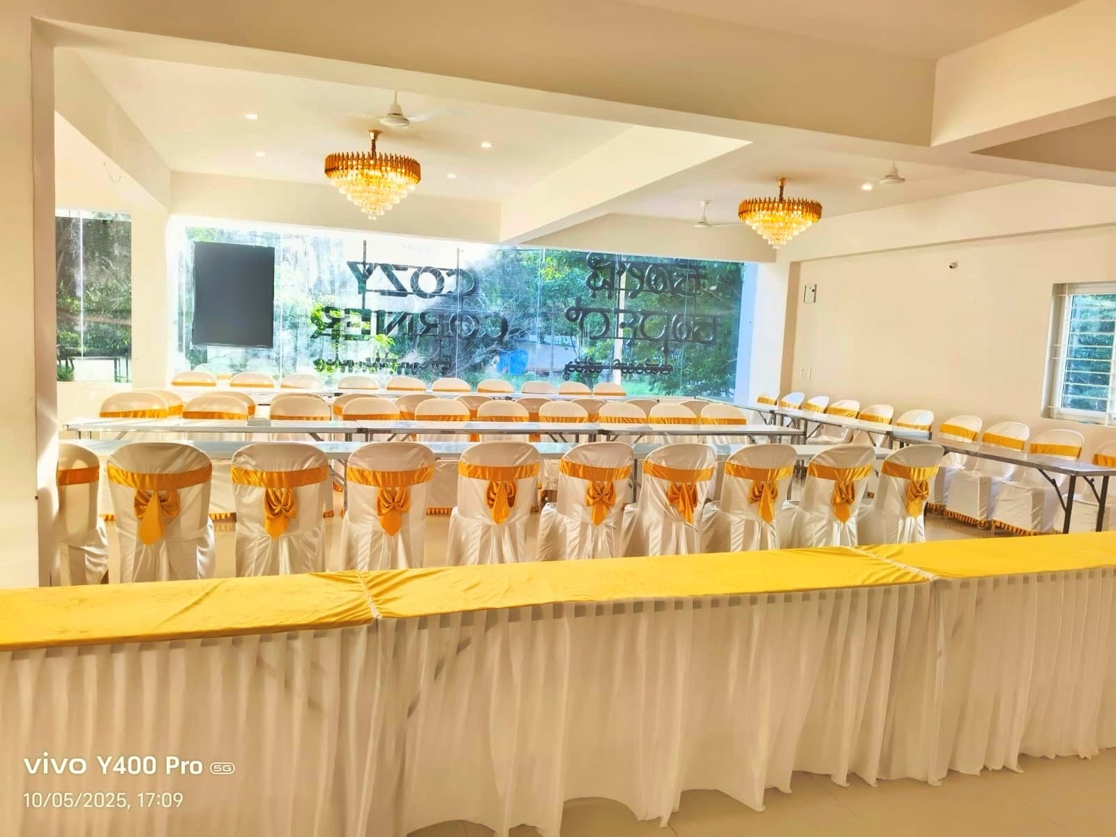 Dining hall with dressed tables and chairs