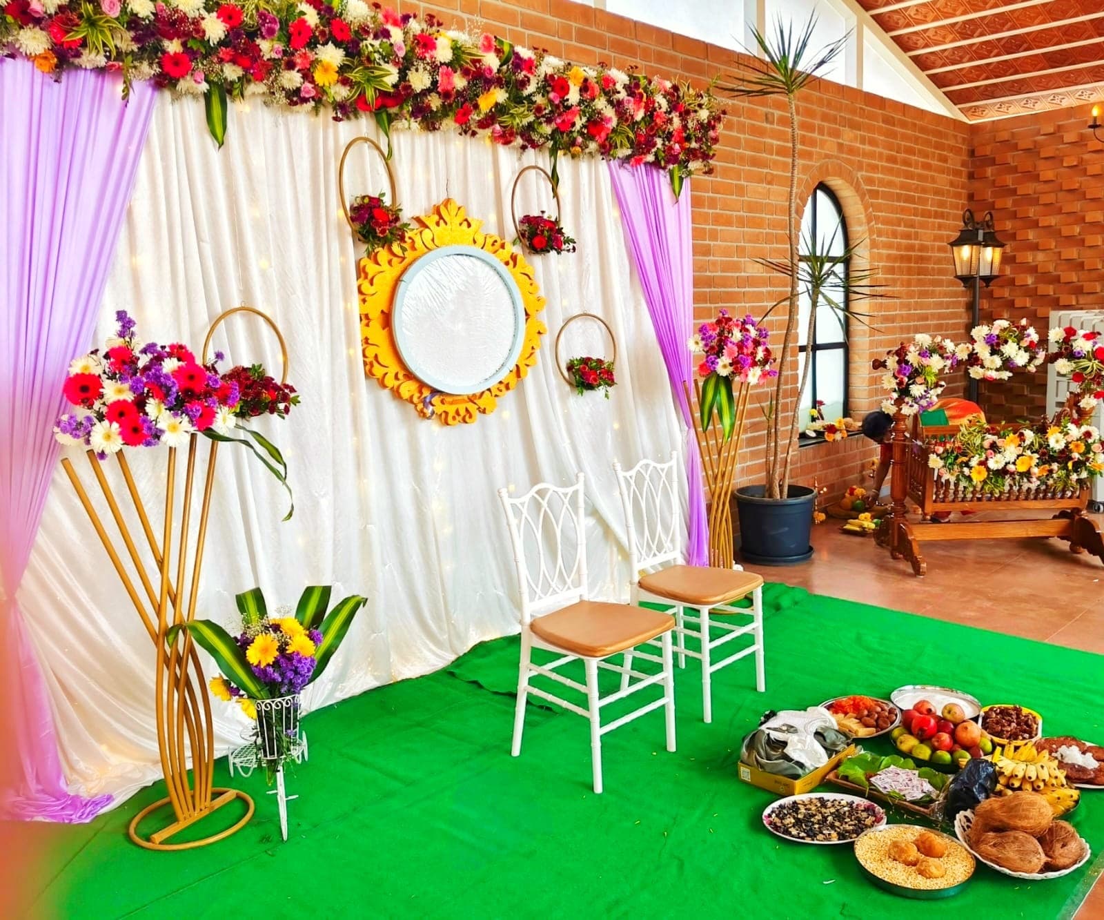 Floral stage with gold mirror frame